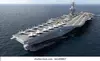 aircraft-carrier-crossing-ocean-3d-260nw-661498807.webp